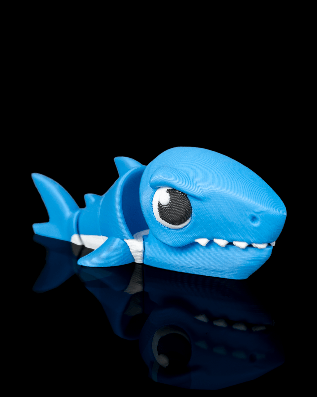 Bite Fin — 3D printed fidget toy, shown in use