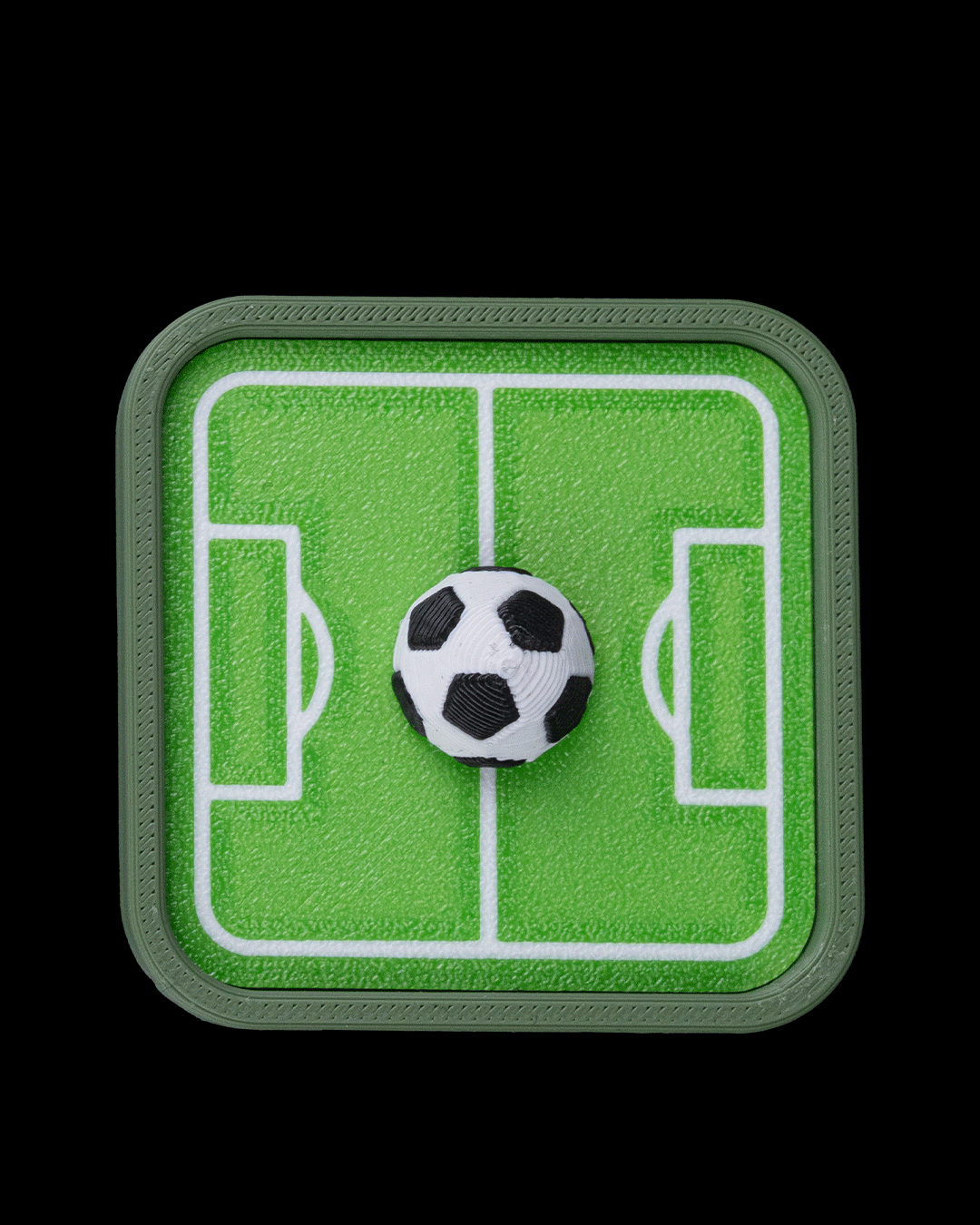 Mini Pitch Fidget — 3D printed soccer gift, on a desk
