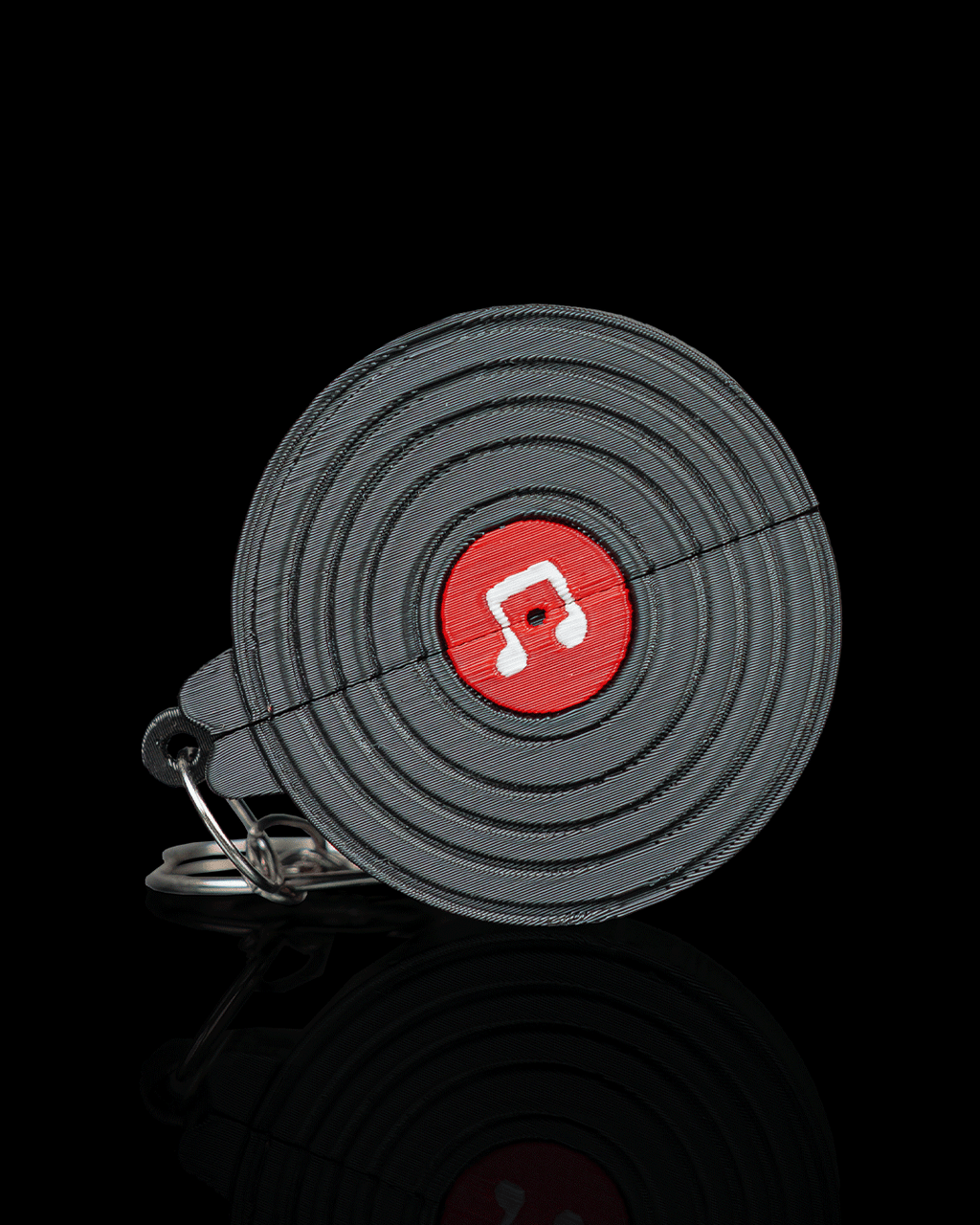 Pocket Vinyl Pick Holder And Keychain — 3D printed guitar pick holder, on a desk