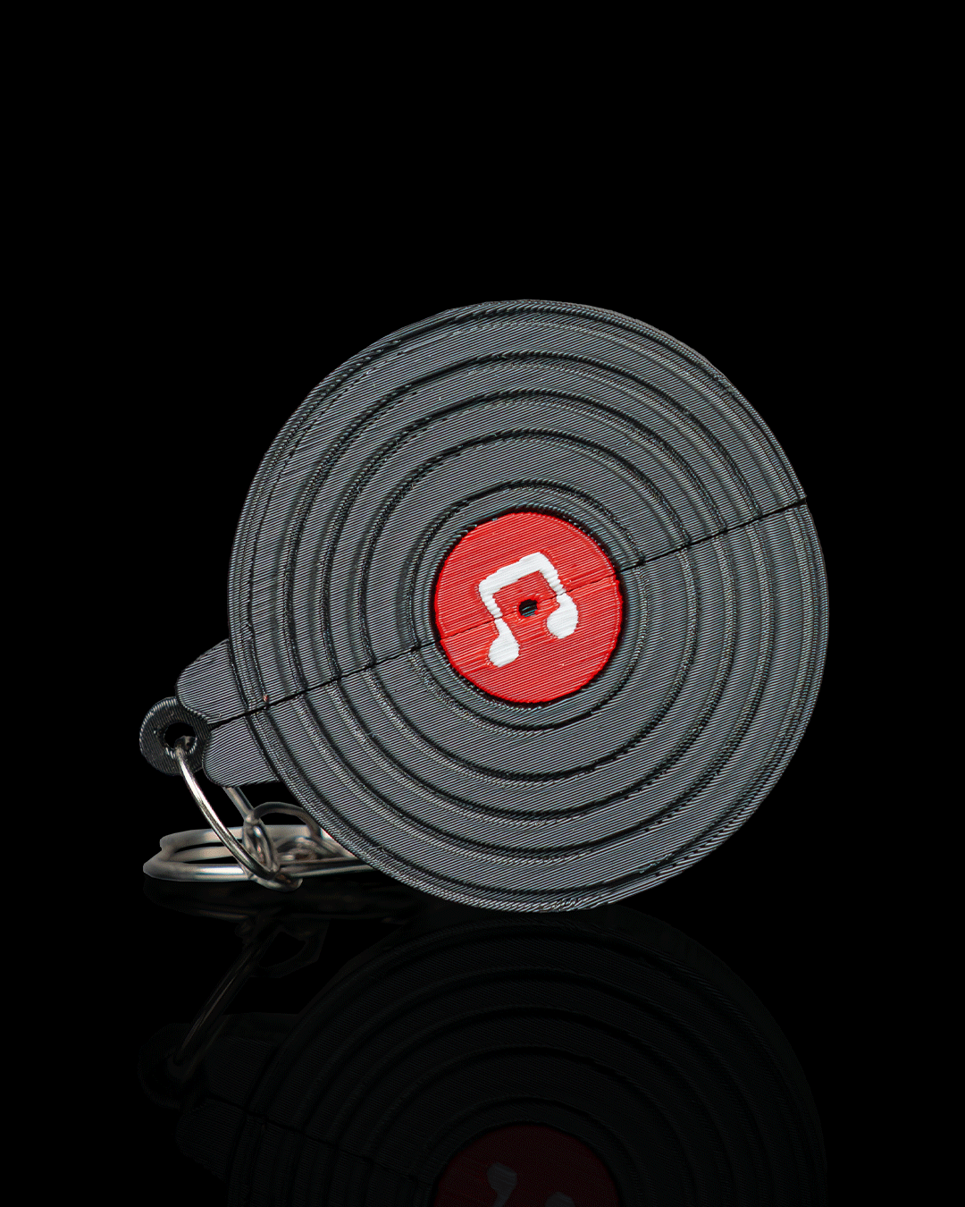 Pocket Vinyl Pick Holder And Keychain — 3D printed guitar pick holder, on a desk