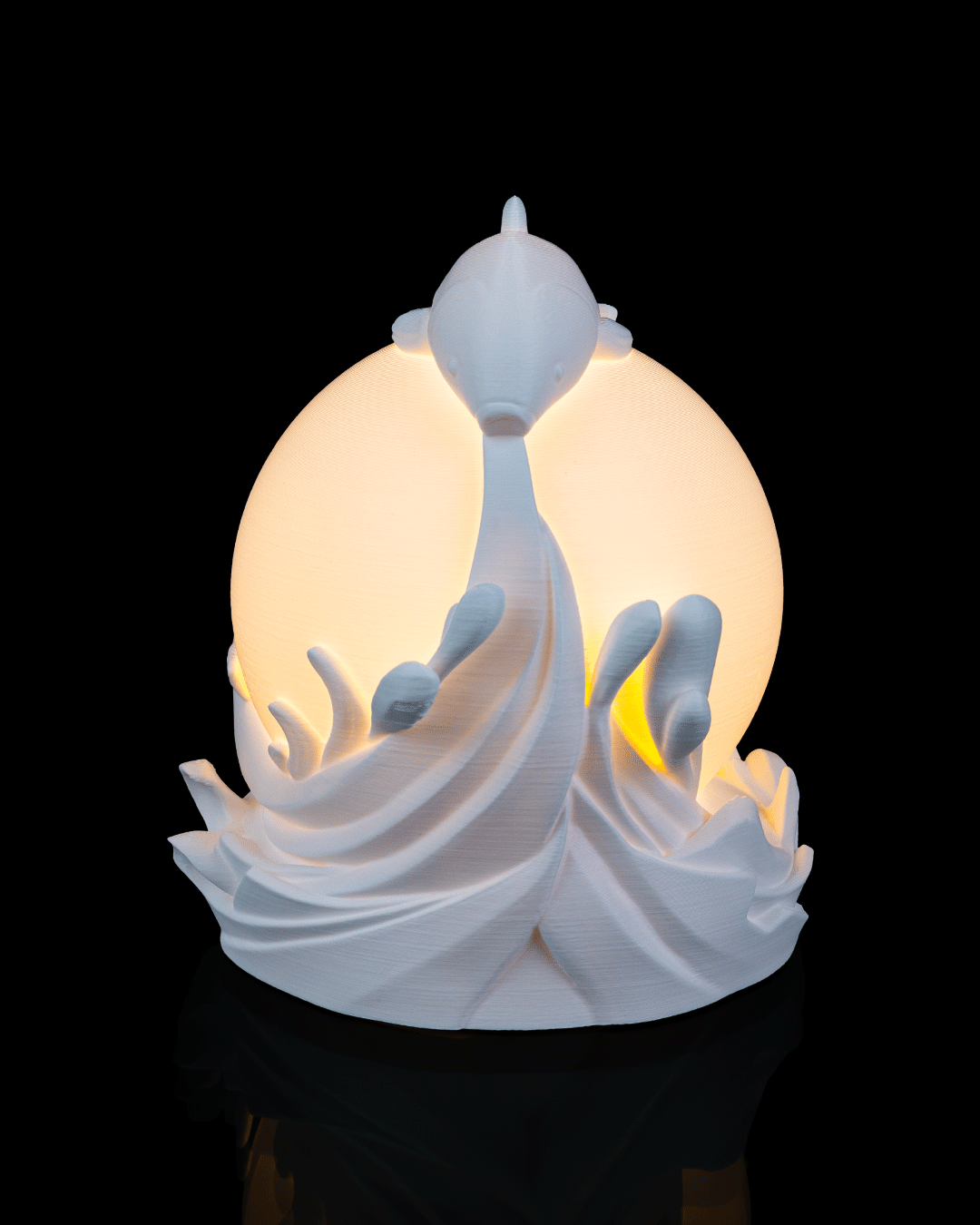 Twin Fish Sphere Table Lamp — 3D printed table lamp, shown in use