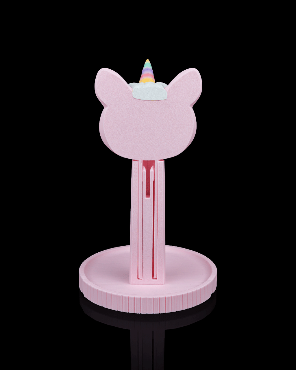 Unicorn Headset Holder — 3D printed headphone stand, styled on a shelf