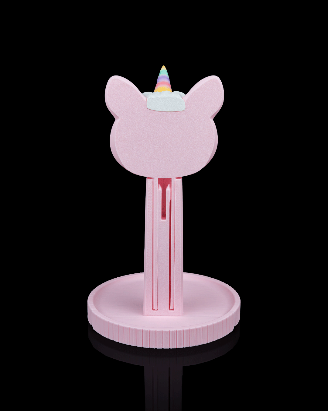 Unicorn Headset Holder — 3D printed headphone stand, styled on a shelf